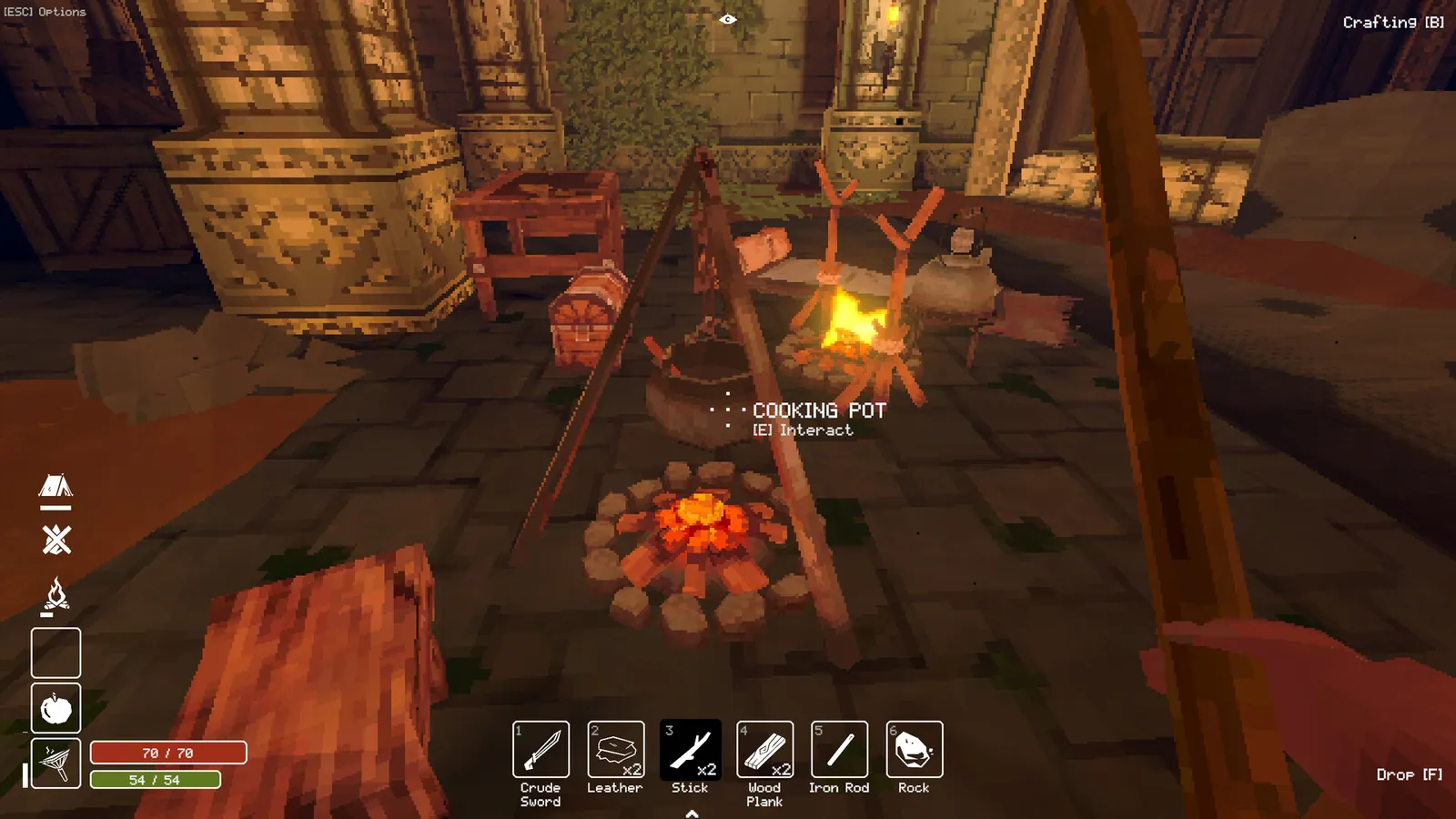 A cooking pot hanging over a campfire, with the hotbar and health and stamina bars at the bottom