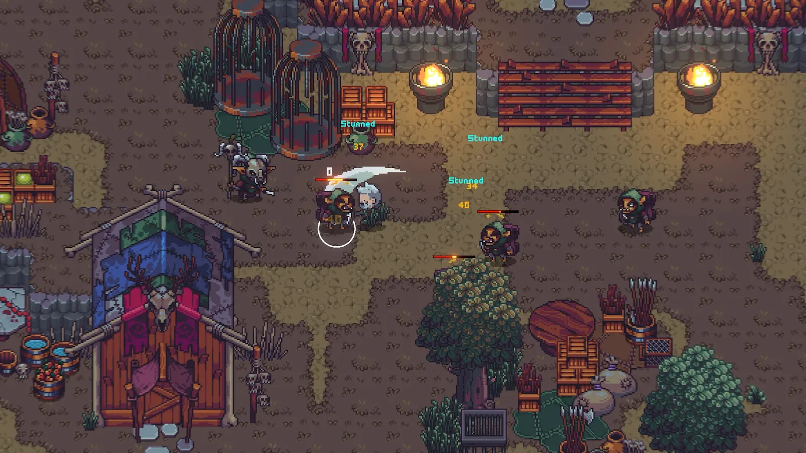 A town square with market stalls, lanterns and a covered stand in the ruined town