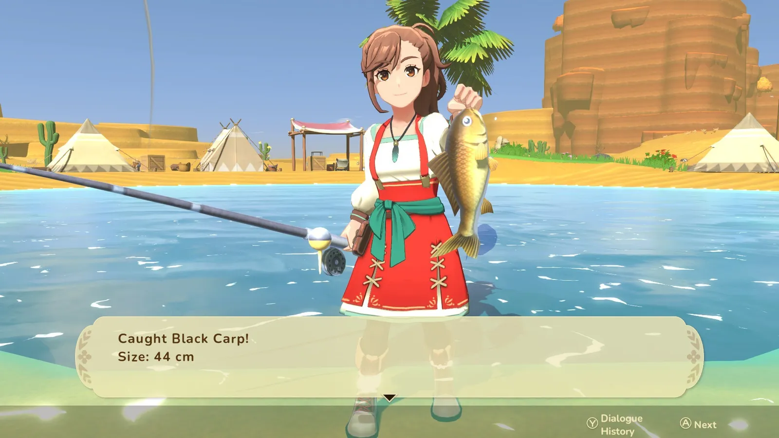 Holding up a freshly caught Black Carp at a desert oasis